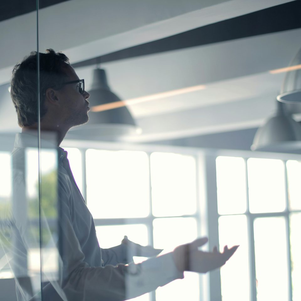 A photo of a person in a meeting